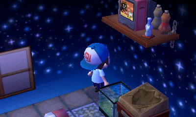 A cat and mouse cartoon on Aurora's hospital TV up on the wall.