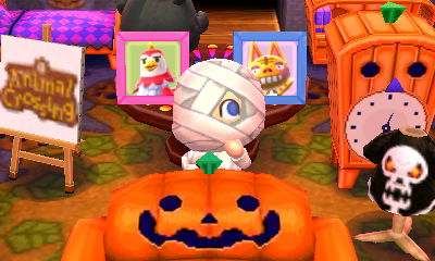 Benedict's pic and Tabby's pic on the table in my messy house.