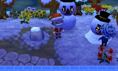 Chris talks to a snowman.
