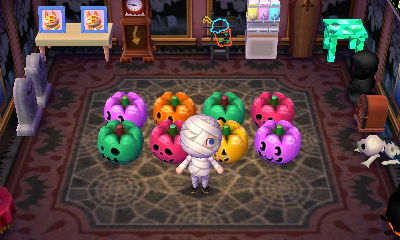My assortment of colored pumpkin heads in my creepy themed room.