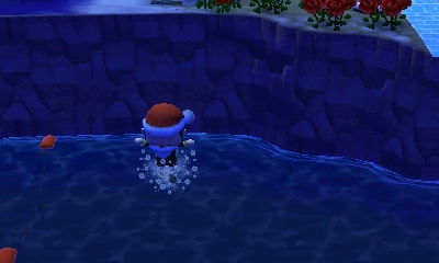 Santa Jeff jumps off a cliff and into the ocean.