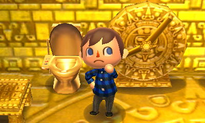 My super toilet customized in gold, next to my golden clock.