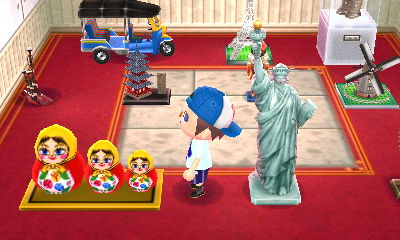 A matryoshka that Gulliver sent me from Russia, near my Statue of Liberty.