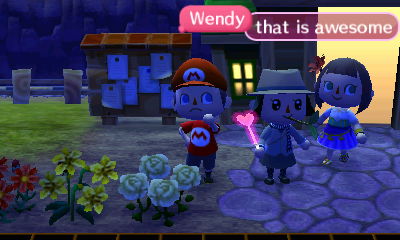 Daisy holds a pink glow stick.