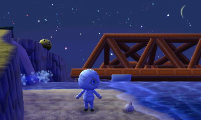 One of my pumpkin head-wearing villagers up on the cliff above me.