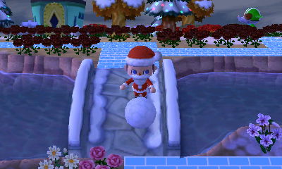 Successfully pushing a snowball across a bridge.