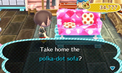 The polka-dot sofa customized with a ruby.