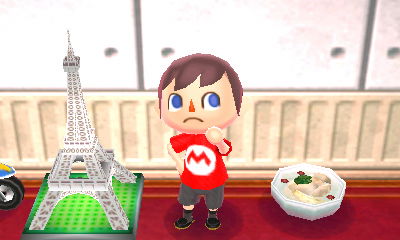 A samgyetang that Gulliver sent me from South Korea, next to my Eiffel Tower.