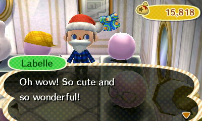 Me trying on the Santa beard as Labelle tells me it looks cute and wonderful.
