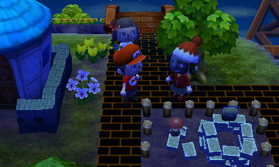 Daisy wearing a clown mask and a Santa hat.