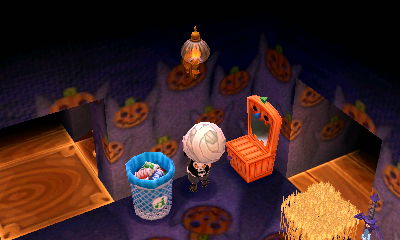 I hang a sconce on the wall of my house.