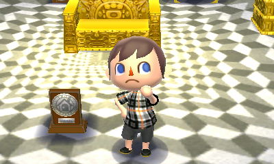 The silver HHA plaque from the Happy Homes Academy.