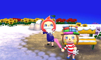 Jeff and Skye holding snowflakes.