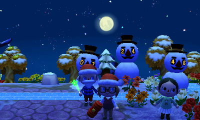 A night shot of my visitors, my snowmen, and a full moon.