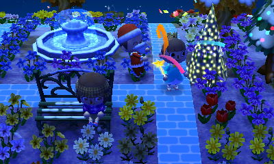 I fire a party popper at Squishy's head near the illuminated tree.