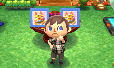 Tabby's pic next to...Tabby's pic! Yes, two Tabby's pics! Yikes!