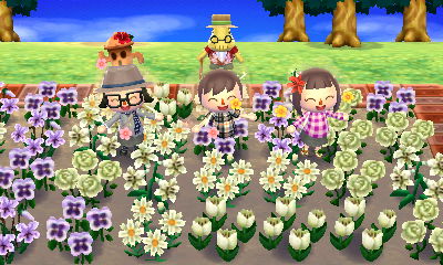 Celebrating a successful gardening tour surrounded by white flowers.