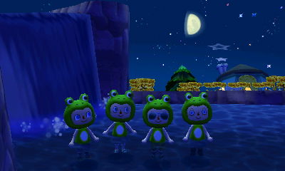 Dressed as frogs in the lake.