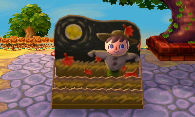 The scarecrow face-cutout standee for the autumn moon (harvest moon) celebration.