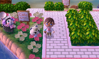 Marshal and Muffy stand by a cafe sign in the dream town of Pastelia.