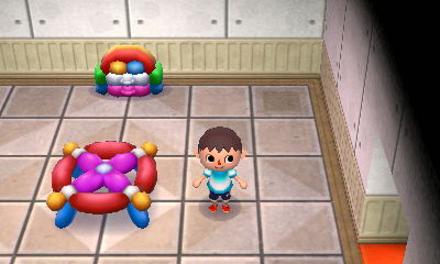 Two pieces of balloon furniture in a museum exhibit room.