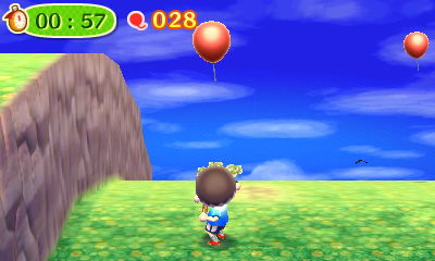 Shooting at balloons with my slingshot on an island tour.