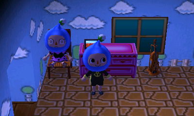 Wendy "whooping" in a chair.