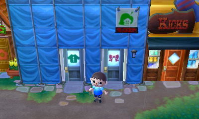 Blue tarp covers a construction area about Able Sisters. The future home of Shampoodle!