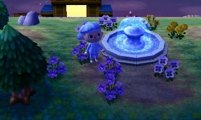 A fountain and flowers in the dream town of Saria.