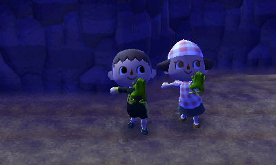 Jeff and Wendy showing off their frogs.