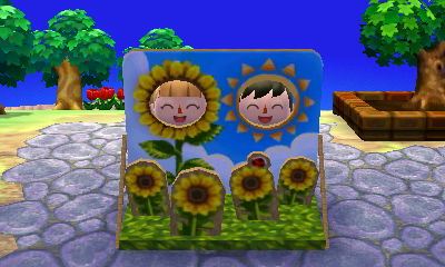 Me and Wendy poking our faces through the Summer Solstice cutout standee in her town.