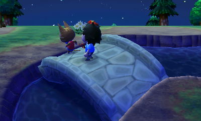 Smacking Katt with a toy hammer.