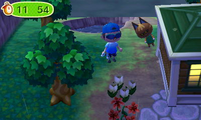 Katt hides behind town hall during a game of hide-and-seek.