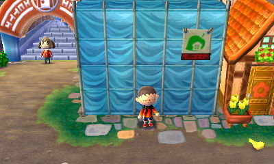 Blue tarp covering T&T Mart as the store is being remodeled.