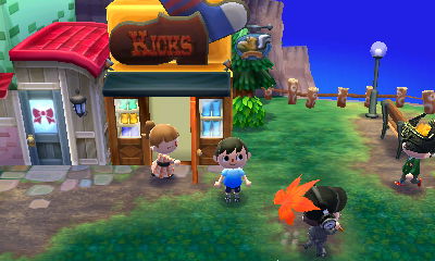 Me and my visitors on Main Street. Wendy is entering the shoe shop Kicks.