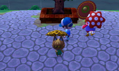 Three villagers holding umbrellas, which all popped up at the same moment!