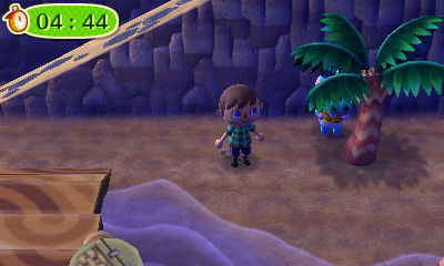 Alli hides behind a palm tree during a game of hide-and-seek.