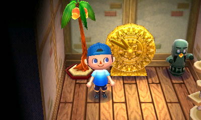 The golden clock I got from Cyrus, on display in my basement.