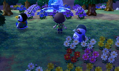 My two penguin villagers, Aurora and Tex, near the Forest fountain.