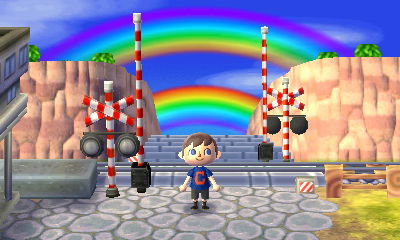 A double rainbow appears at the entrance to Main Street.