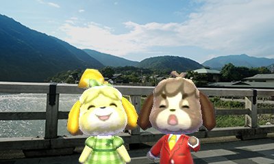 Isabelle and Digby in an Amiibo Camera picture. This feature is coming to Animal Crossing: New Leaf in fall 2016.