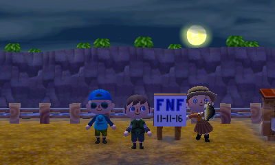 Michael, Jeff, and Merka standing by the sign: FNF 11-11-16.