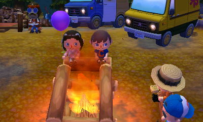 The four of us sitting around the fire at the campground.