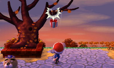 Popping a balloon present in front of the bare town tree.