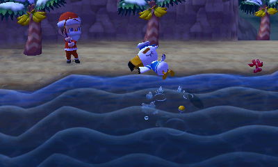 Santa Jeff fishing in the ocean as a sleeping Gulliver naps nearby.