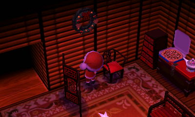 The festive wreath on display in my New Leaf house.
