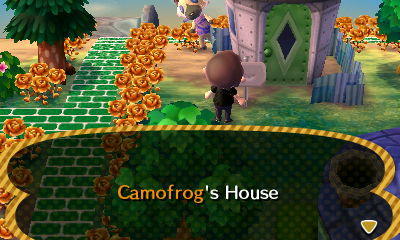 Vivian peeks out from behind Camofrog's house during a game of hide-and-seek in Animal Crossing: New Leaf.