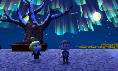 The northern lights in the skies above Forest's town tree and Isabelle.