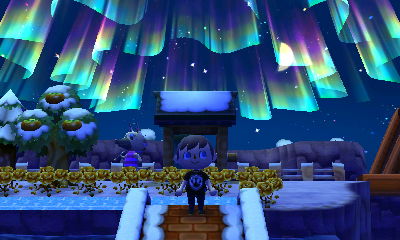 The northern lights shine in the sky above a zen bell PWP in Animal Crossing: New Leaf.