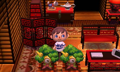 Two sapling clocks in my Animal Crossing: New Leaf house.